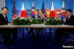 U.S. President Joe Biden, U.S. Secretary of State Antony Blinken, U.S. Defense Secretary Lloyd Austin, South Korea's President Yoon Suk-yeol and Japanese Prime Minister Fumio Kishida meet during a NATO summit in Madrid, Spain, June 29, 2022. REUTERS/Jonathan Ernst