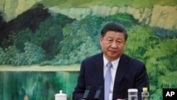 Chinese President Xi Jinping looks on as he meets with US Secretary of State Antony Blinken in the Great Hall of the People in Beijing, June 19, 2023. 