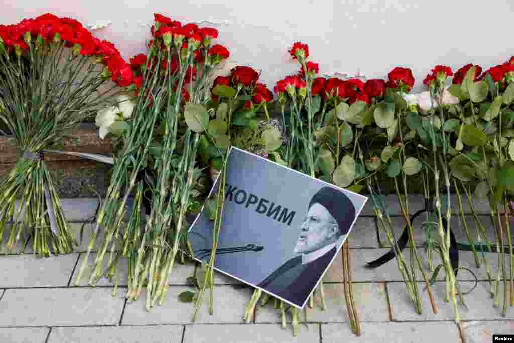 A view shows flowers outside the Iranian embassy in Moscow, Russia, placed to pay tribute to Iran&#39;s President Ebrahim Raisi, Foreign Minister Hossein Amirabdollahian and other victims of a recent helicopter crash in mountainous terrain near Iran&#39;s border with Azerbaijan,&nbsp;May 20, 2024.