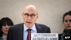 资料照片：2024年2月29日，联合国人权事务高级专员福尔克尔·蒂尔克在日内瓦举行的人权理事会第55届会议上作报告。（法新社照片）
