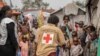 Red Cross officials create awareness of mpox in the Don Bosco refugee camp in Goma, Democratic Republic of the Congo, Aug. 22, 2023.