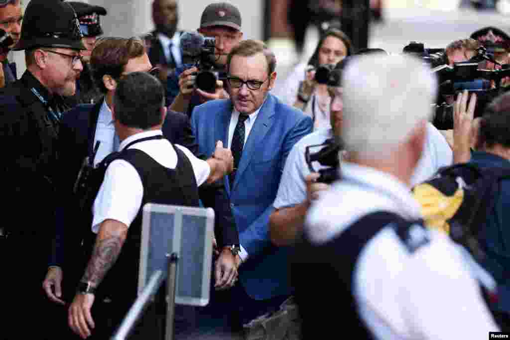 Actor Kevin Spacey arrives at the Central Criminal Court in London before attending a hearing over charges related to allegations of sex offenses.