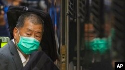 FILE - In this Feb. 1, 2021, photo, democracy advocate Jimmy Lai leaves Hong Kong's Court of Final Appeal where the government is arguing against allowing him bail in Hong Kong. 
