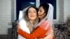 Netchanok "Love" Promkao and Dmytro "Jane" Denysov hug each other in a YouTube video clip, where they talk about their marriage situation