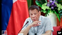 In this photo provided by the Malacanang Presidential Photographers Division, Philippine President Rodrigo Duterte talks at the Malacanang presidential palace in Manila, Philippines, Monday, Sept. 7, 2020. (Karl Norman Alonzo/Malacanang Presidential Photo