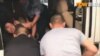 香港Now TV 记者2018年5月16日在京采访时被押上警车 （网络照片）