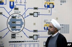 President Hassan Rouhani visits the Bushehr nuclear power plant just outside the port city of Bushehr, Iran, Jan. 13, 2015, in this photo released by the Iranian Presidency Office.