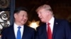 佛罗里达州海湖庄园，中国领导人习近平（左一）与美国总统川普（右一）相视微笑。