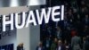 FILE - A logo of Huawei is seen during the Mobile World Congress in Barcelona, Spain.