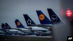 Aircrafts of German Lufthansa airline are parked on a runway at the airport in Frankfurt, Germany, May 4, 2020. Lufthansa is in negotiations with the German government about financial aid.