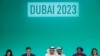 TOPSHOT - COP28 president Sultan Ahmed Al Jaber (C) presides the opening ceremony of the COP28 United Nations climate summit in Dubai on November 30, 2023.