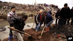 Dîmenek kevin ji geryanê li paşmaya qûrbanîyên bi destê Hizbullah hatîn kûştin
