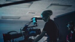 FILE - This photo provided by Jack Caswell shows director of photography Halyna Hutchins on the set of 'Archenemy' on Dec. 17, 2019, in Los Angeles.