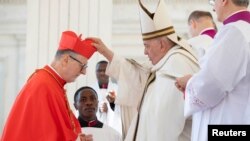 Pope Francis leads a consistory ceremony