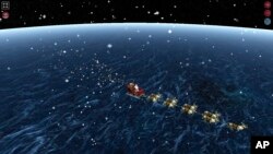หน้าเว็บไซต์ติดตามซานต้า NORAD Track Santa เมื่อ 24 ธ.ค. 2021 (AP)