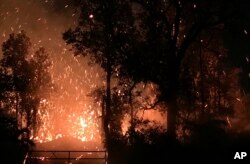 This photo provided by Shane Turpin shows results of the eruption from Kilauea Volcano on Hawaii's Big Island Friday, May 4, 2018.