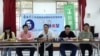 吾尔开希参选及政见发布会（右二为吾尔开希，中间是姚立明）