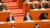 中国第十二届全国人民代表大会第四次会议3月5日星期六在北京人民大会堂开幕，在主席台就坐的国家主席习近平（中）和政协主席俞正声，李克强向到场代表鞠躬致谢。（2016年3月5日 美国之音金子莹拍摄）
