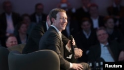 Facebook CEO Mark Zuckerberg speaks at the Axel Springer Award ceremony in Berlin, Feb. 25, 2016. 