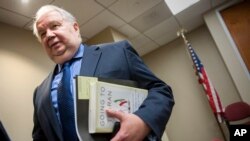 Russia's ambassador to the U.S. Sergey Kislyak, speaks with reporters in Washington, Jan. 13, 2017.