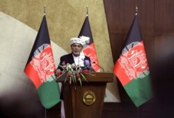 Afghan President Ashraf Ghani speaks at the extraordinary meeting of the Parliament in Kabul, Aug. 2, 2021.