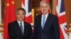 中国副总理胡春华与英国财政大臣哈蒙德2019年6月17日在伦敦会晤。