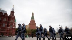 Servicemen of the Russian National Guard (Rosgvardia) secure Manezhnaya Square just outside the Kremlin in Moscow on Oct. 20, 2022.
