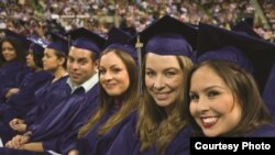 Students sit at the graduation ceremony at Del Mar College in Corpus Christi, Texas.
