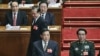 2012年北京两会会场上的薄熙来，他后面是温家宝，右侧是徐才厚