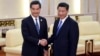 2014年11月9日中国国家主席习近平（右）在北京人民大会堂和香港特区行政长官梁振英(左)会面握手