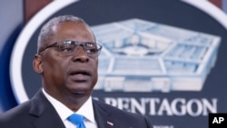 Defense Secretary Lloyd Austin speaks at a press briefing at the Pentagon, Wednesday, July 21, 2021 in Washington. (AP Photo/Kevin Wolf)