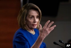 FILE - Speaker of the House Nancy Pelosi, D-Calif., talks with reporters during her weekly news conference, on Capitol Hill in Washington, Feb. 7, 2019.