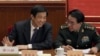 2010年薄熙来和徐才厚将军在全国政协会议上。上次会面在京城，下次会面在秦城？