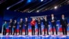 FILE - The seven participants line up before the start of the 2020 Democratic U.S. presidential candidates' debate in Houston, Sept. 12, 2019.