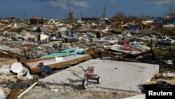 A child's bicycle is seen in a destroyed neighborhood in the wake of Hurricane Dorian in Marsh Harbour, Great Abaco, Bahamas, 