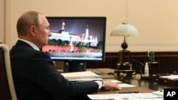 Virus Outbreak Russia Putin