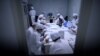 TOPSHOT - Researchers work in a lab at the Yisheng Biopharma company in Shenyang, in China’s northeast Liaoning province on June 10, 2020. - The company is one of a number in China trying to develop a vaccine for the COVID-19 coronavirus. (Photo by…