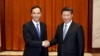 2015年5月4日台湾国民党主席朱立伦（左)在北京人民大会堂与中国国家主席习近平握手