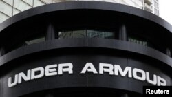 FILE - An Under Armour sign is seen outside a store in Chicago, Oct. 25, 2016. Under Armour said March 29, 2018, that it was working with data security firms and law enforcement in the wake of a data breach affecting 150 million MyFitnessPal diet an