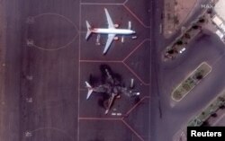 Satellite image shows a destroyed Ukrainian airplane at Khartoum International Airport