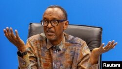 Rwanda's President Paul Kagame addresses a press conference at the Kigali Convention Center, in Kigali