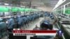 英媒指中国经济总量将在今年跃居世界第一