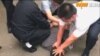 香港驻京记者2018年5月16日采访被公安强行带走 （网络照片）