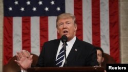 U.S. President Donald J. Trump delivers his first address to a joint session of Congress from the floor of the House of Representatives in Washington, D.C., Feb. 28, 2017.